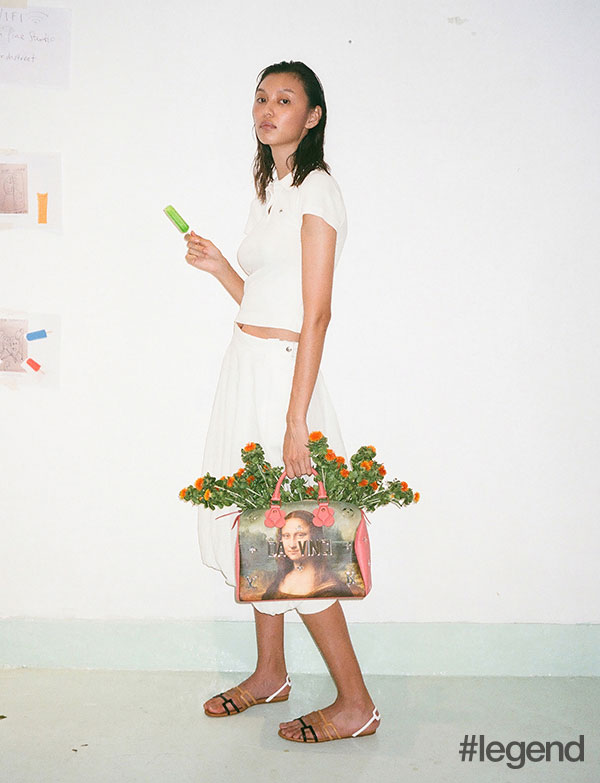 Shirt _ Lacoste | Skirt _ Loewe | Shoes _ Hermès | Bag _ Louis Vuitton